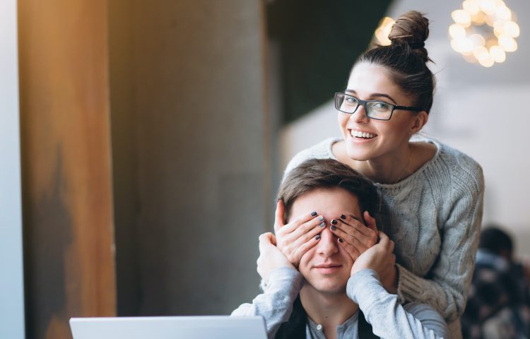 Girlfriend making her boyfriend surprise and closing eyes